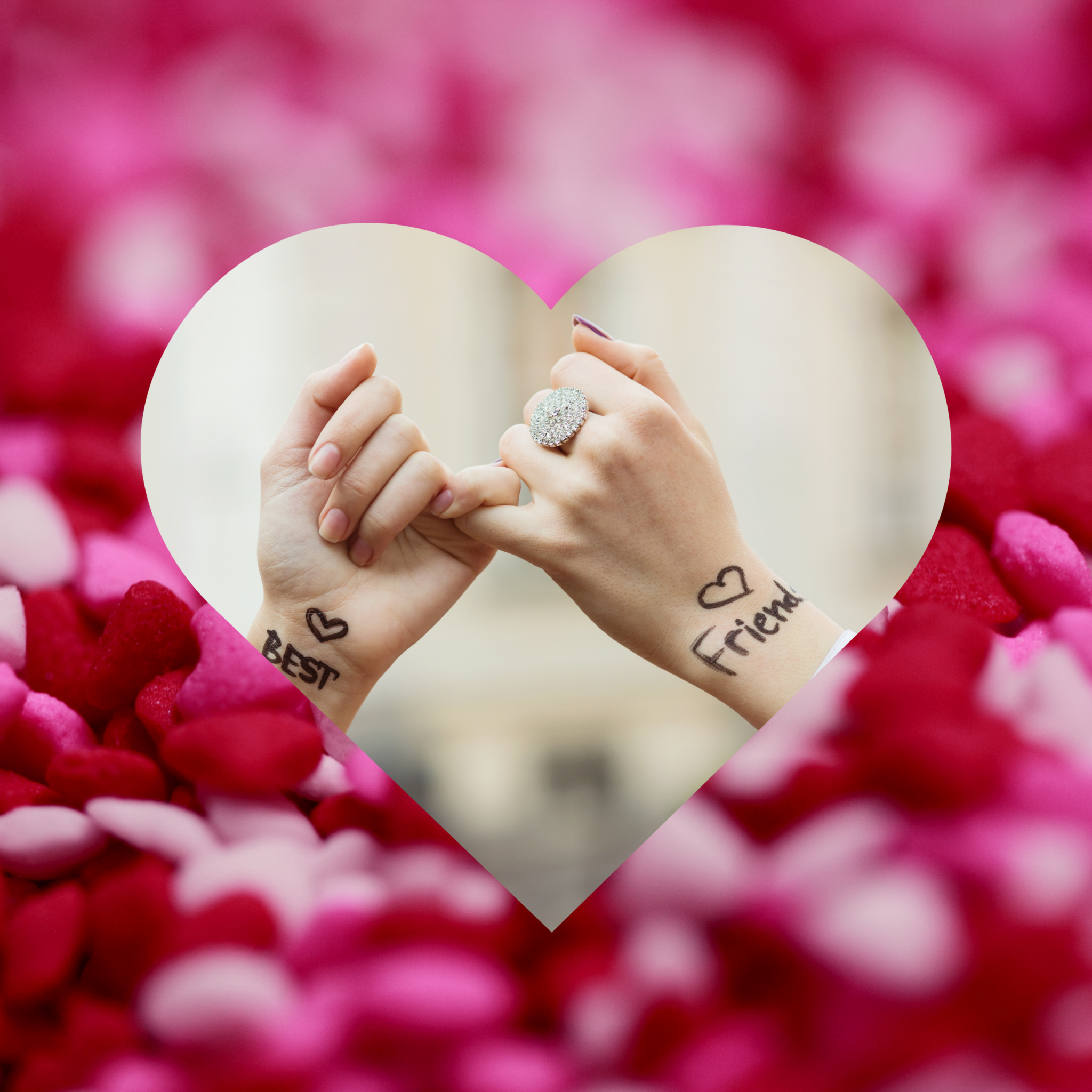image contains two female hands linking pinkies in a heart shaped frame set on pink hears background